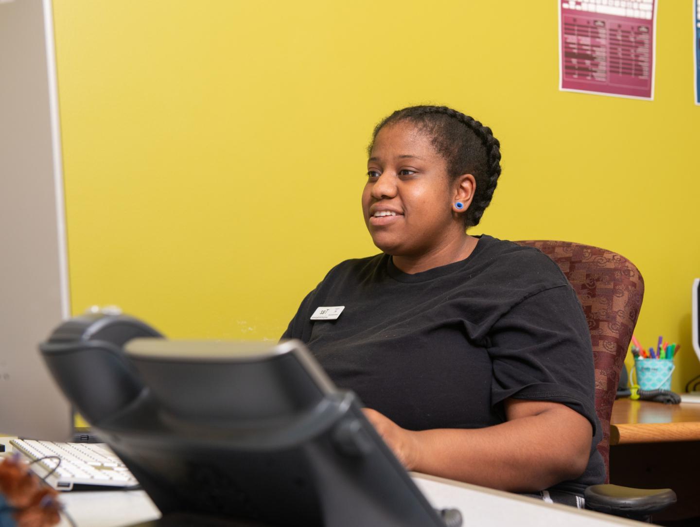 LTS Help Desk student employee at a workstation